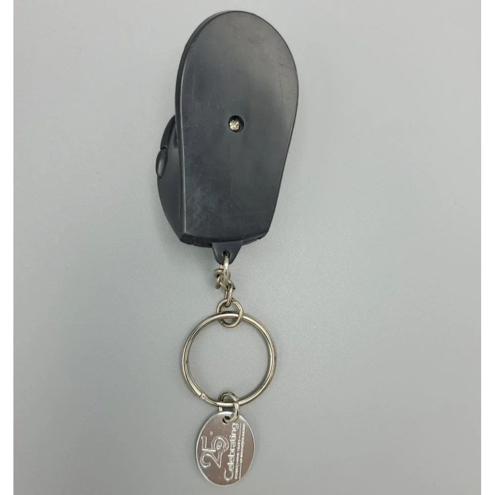 Vintage Logitech‎ Mouse Keychain Light Advert 25th Anniversary Nostalgia